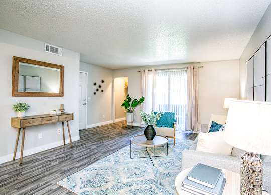 a living room with a couch and a table