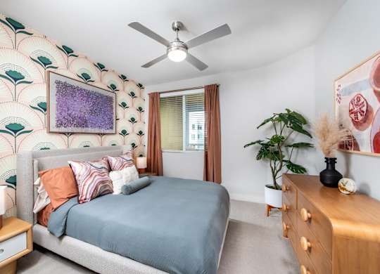 Bedroom with ceiling fan at Bevel Apartments in San Diego CA