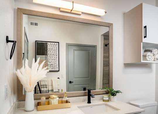 Model Pewter Bathroom Mirror at Chroma Apartment Homes in Canoga Park CA