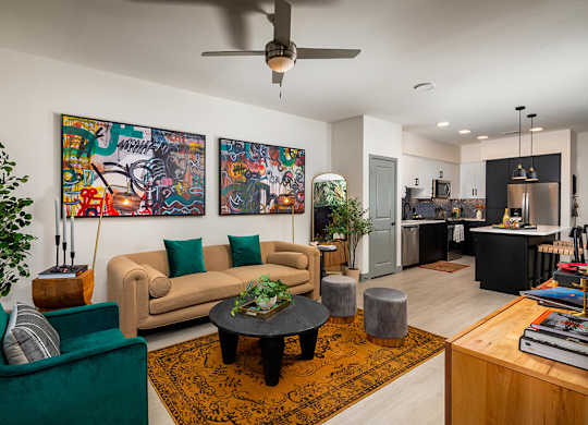 Model Pewter Living Room and Kitchen at Chroma Apartment Homes in Canoga Park CA