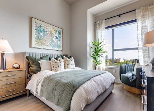 Sage design secondary bedroom at 1010 Waugh Apartments in Houston TX