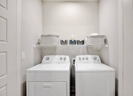Model Sandalwood Design Package Washer and Dryer at 1810 Main Apartments in Houston TX