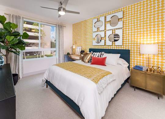 Bedroom with ceiling fan at Avel Apartment Homes in Orange CA