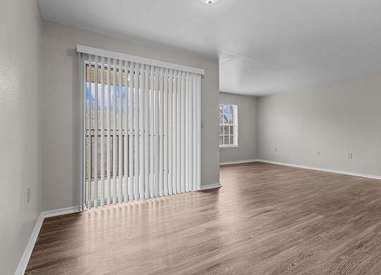 Modern Dining room wtih patio access at Valley Ridge Apartments in Lewisville TX
