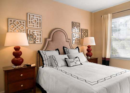 Light filled bedroom at River Pointe at Den Rock Apartments in Lawrence, MA