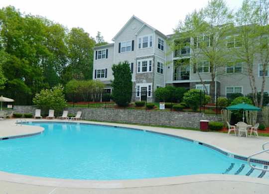 Large swimming pool at River Pointe at Den Rock Apartments in Lawrence, MA