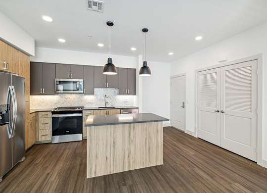 Kitchen with island at The Braydon Apartments in Napa CA