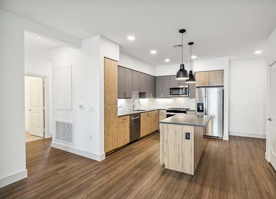 View of kitchen from living room at The Braydon Apartments in Napa CA