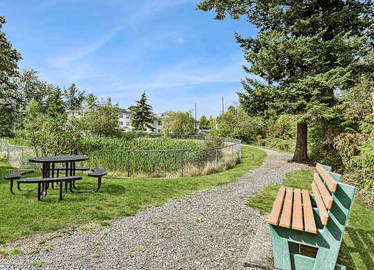 Picnic table and pathway at Woodrose Senior Affordable Apartments in Bellingham WA