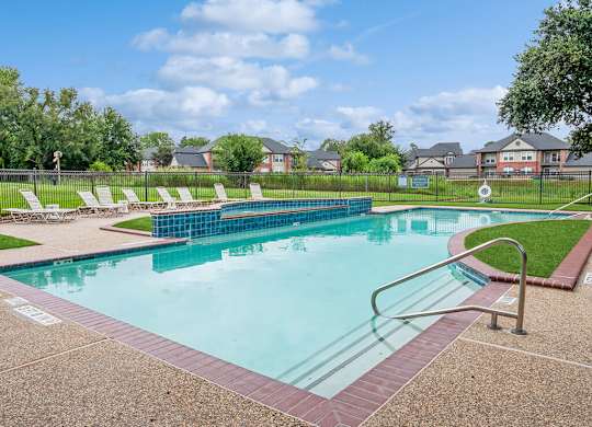 Large outdoor pool at Hollow Creek Apartments in Conroe TX