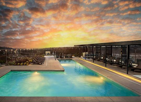 Pool at dusk at Chromatic Flats Apartments in San Diego CA