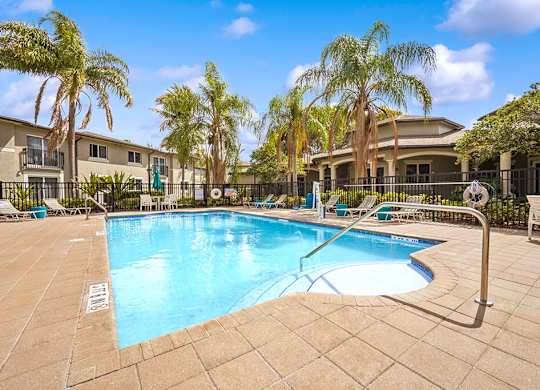 Outdoor pool at Emerald Dunes Apartments in Miami Gardens FL