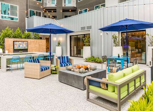 Pool patio with fire lounge at Avel Apartment Homes in Orange CA