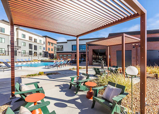 Pool courtyard seating area at Olivean Apartments in Broomfield CO
