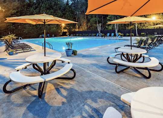 Poolside seating at Cobalt Springs Apartment Homes in Taylors SC