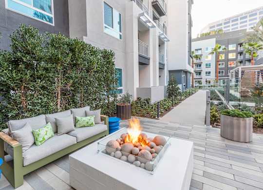 Pool Vibe Small Fire Table at Vita Apartment Homes in Orange CA