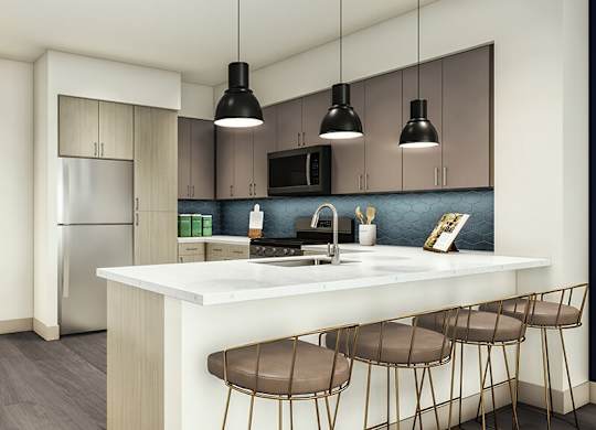 Kitchen with breakfast bar at Altitude Apartments in South San Francisco CA