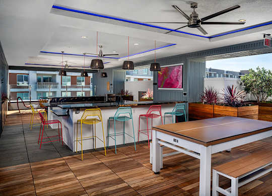 Rooftop Euphoria Table and Kitchen at Chroma Apartment Homes in Canoga Park CA