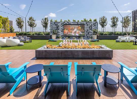 Rooftop lounge with theatre at Avel Apartment Homes in Orange CA