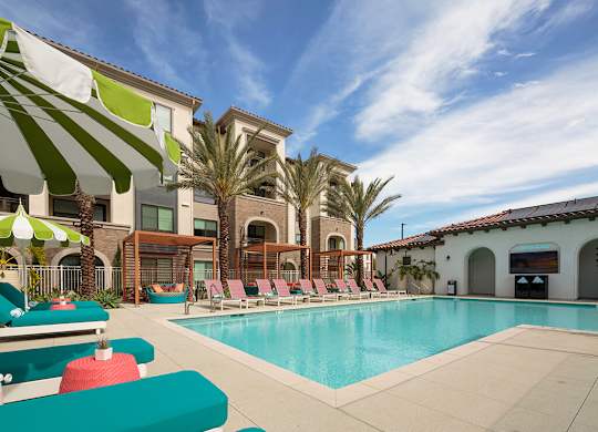 Poolside seating at CALIXA Apartment Homes in Camarillo CA