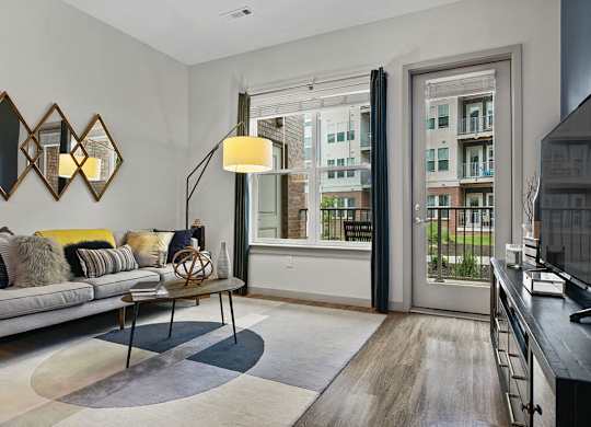 Living room furnished at The Slate at Andover Apartments in Andover MA