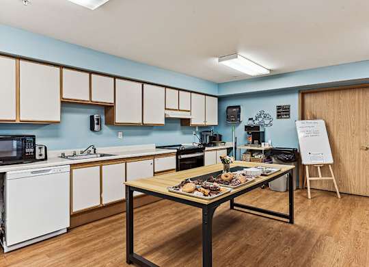 Social lounge kitchen at Woodrose Senior Affordable Apartments in Bellingham WA