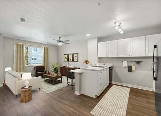 Model Kitchen and Living Room at Auburn Court Apartments in Auburn WA