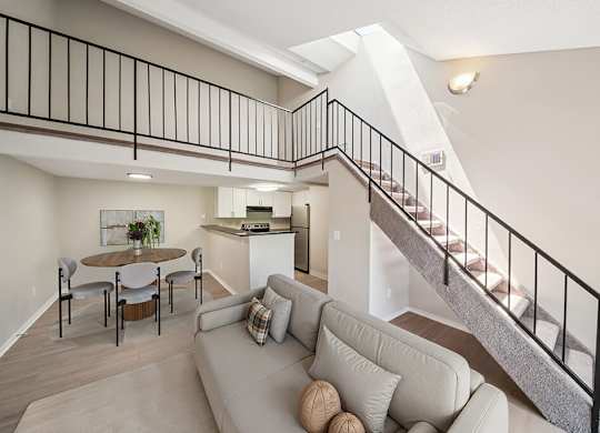 Staged Loft Living Room and Kitchen at Sky Rock Apartments in Longmont CO