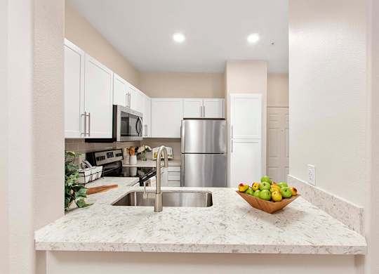 Kitchen counters at Sierra at Otay Ranch Apartments in Chula Vista CA