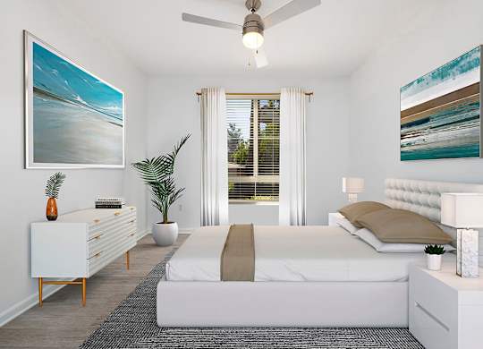 Bedroom with ceiling fan at Landara Apartments in Ontario CA