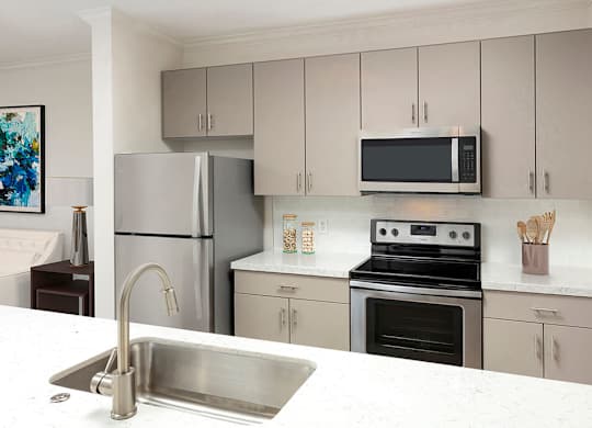 Kitchen with appliances at Landara Apartments in Ontario CA