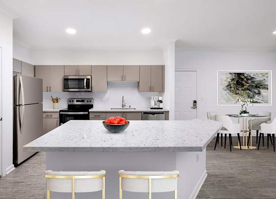 Kitchen with white counters at Landara Apartments in Ontario CA