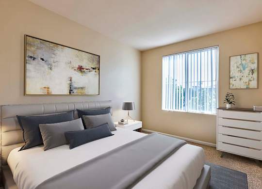 Bedroom with window at Landara Apartments in Ontario CA
