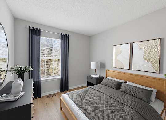 Bedroom with window at Greens of Pine Glen in Durham NC