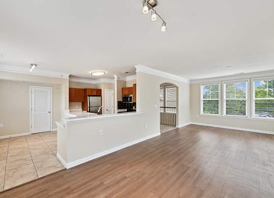 Living room with view of kitchen at Westerchester at the Pavillions in Waldorf MD