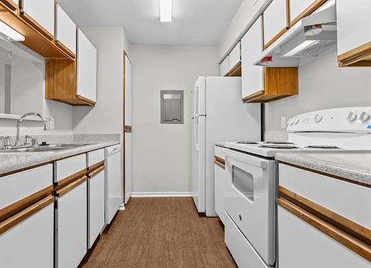 Traditional kitchen with dishwasher at Valley Ridge Apartments in Lewisville TX