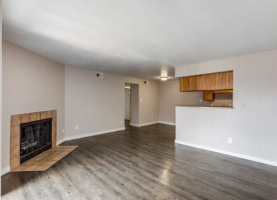 Kitchen with wood cabinets at Mission James Place Apartments in Austin TX