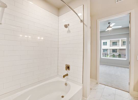 Chrome Design Package Bathroom Shower at 1810 Main Apartments in Houston TX