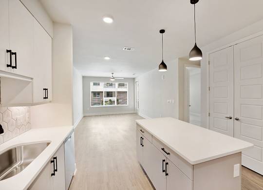 Chrome Design Package Kitchen and Living Room at 1810 Main Apartments in Houston TX