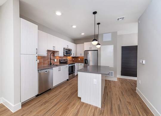 Clay design kitchen at Olivean Apartments in Broomfield CO