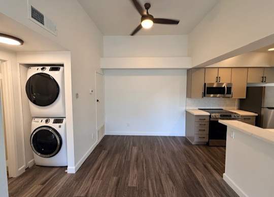 A laundry room with a washer and dryer.