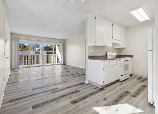 Dining Area and Living Room at Canyon Rim Apartments in San Diego CA