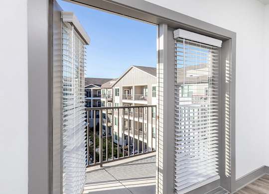 Large window to patio at Cala Apartments in Austin TX