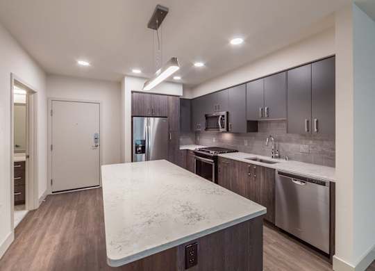 Vacant Mineral Design Package Kitchen at North at Totem Lake Apartments in Kirkland WA