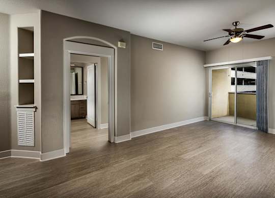 Living room with ceiling fan at Madison at Town Center Apartments in Santa Clarita CA