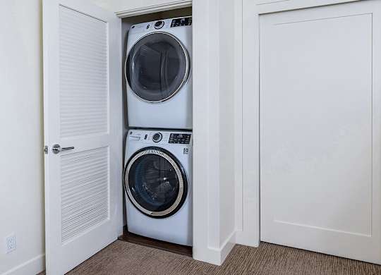 Stacked washer and dryer at The Cove at Tiburon Apartments in Tiburon CA