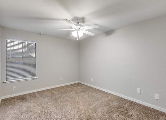 Primary bedroom at Mission James Place Apartments in Austin TX
