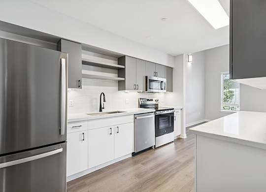 Renovated kitchen galley kitchen at Riverpark Apartments in Redmond WA
