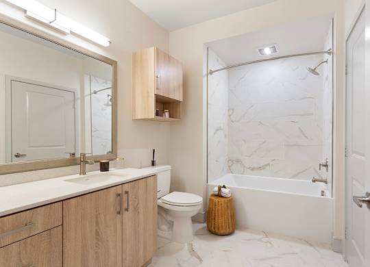Vacant Sparkle Design Package Bathroom at Chroma Apartment Homes in Canoga Park CA