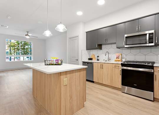 Vacant Sparkle Design Package Kitchen at Chroma Apartment Homes in Canoga Park CA